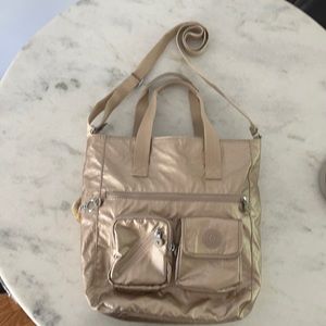 NWOT Kipling rose gold bag!